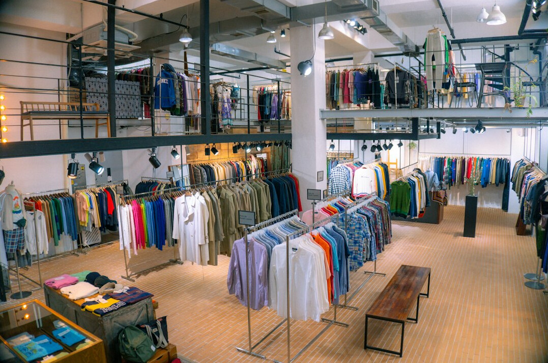 Modern retail store interior with clothing displays