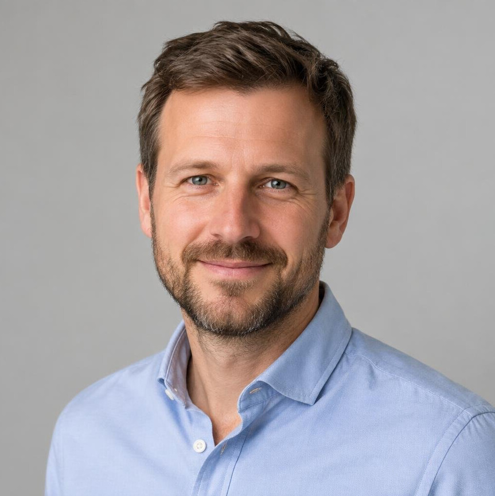 Portrait of a bearded man in casual shirt